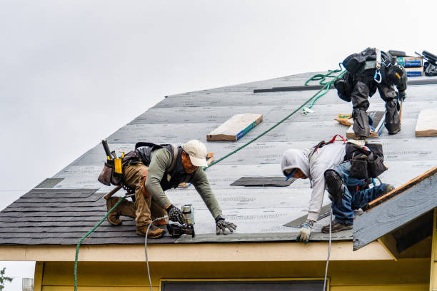 Professional Gutter Installation technician working in Corvallis, OR